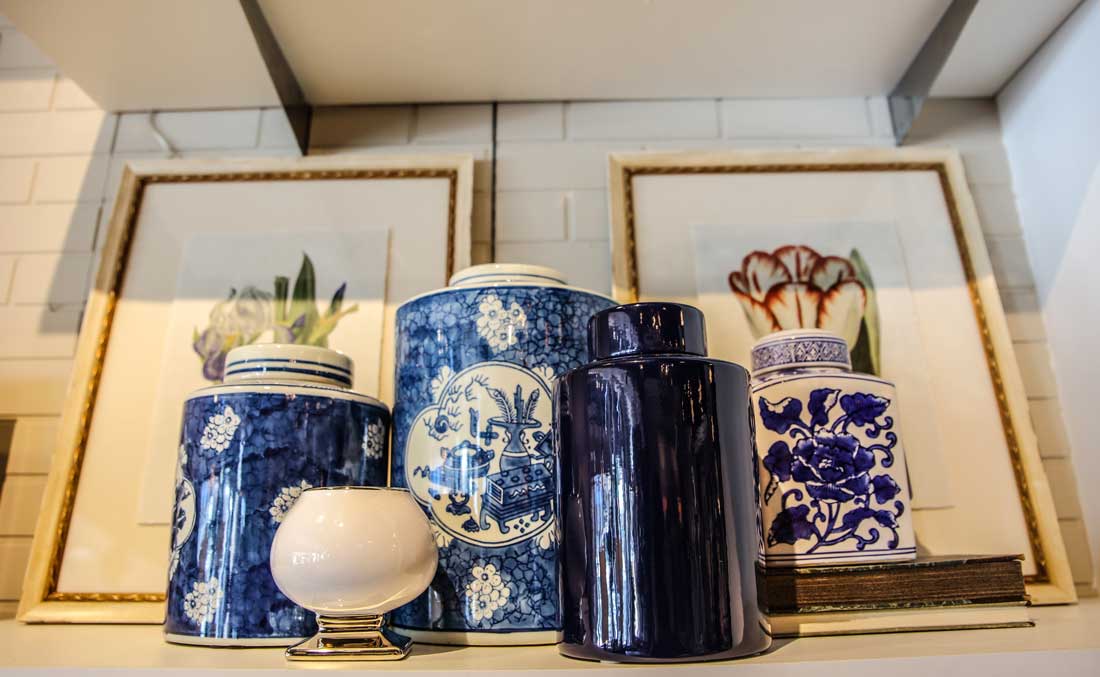 Chinoiserie blue and white porcelain pieces and artwork