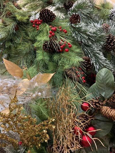 Greenery is a great holiday gift idea such as wreaths, garland, a centerpiece and more