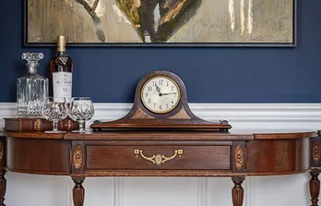 Dining Room Interior Design with navy blue wall colors and white paneling